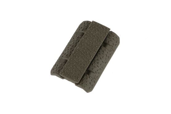The Magpul Industries od green m-lok rail cover features an aggressive no slip texture